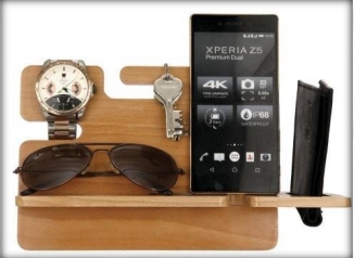wooden table top mobile with key, clock, watch and googles