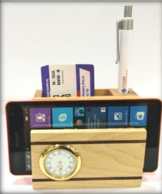 wooden table top clock with mobile and pen with card 