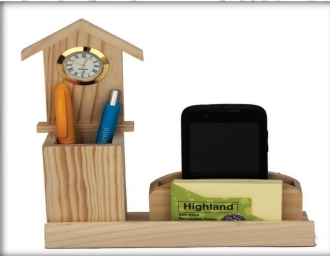 wooden table top clock with pen and mobile with card