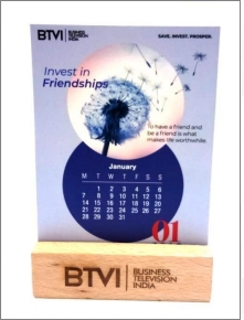 wooden table top with a calender